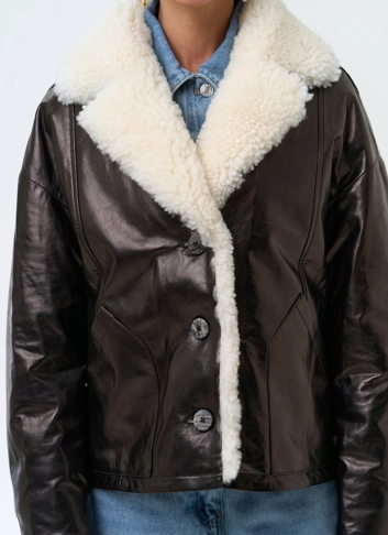 Женский кожаный пуховик из натуральной кожи